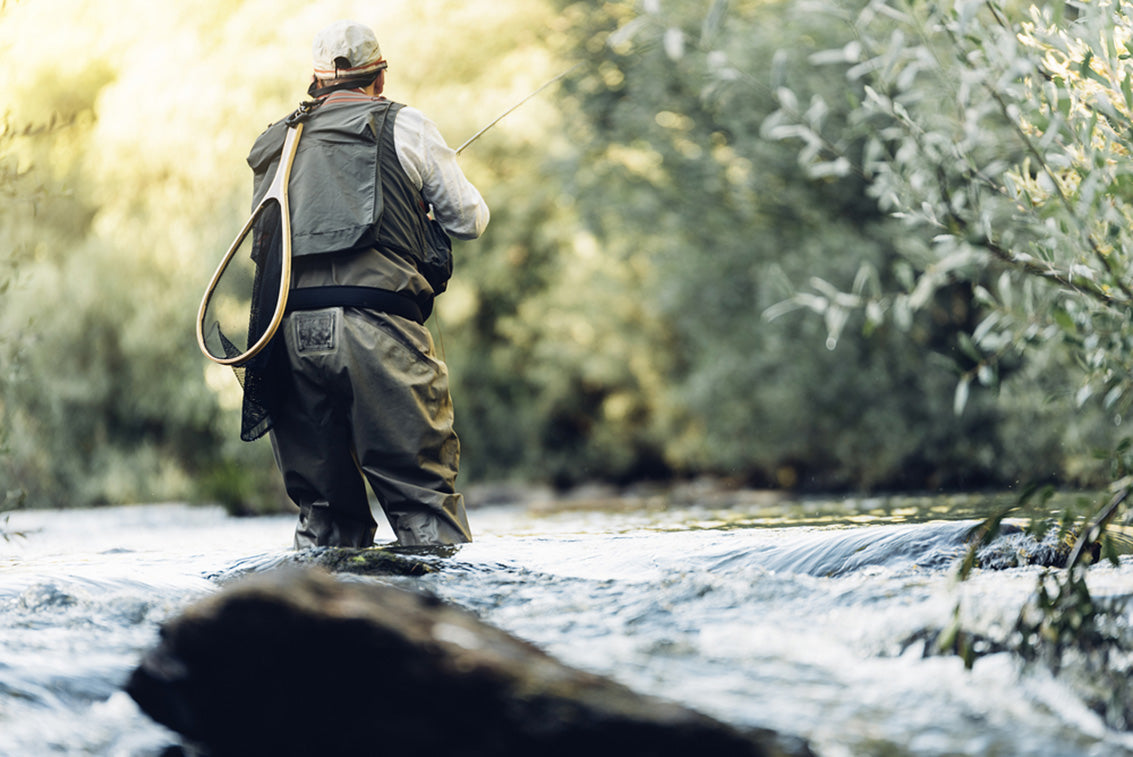 fly fisherman using rod