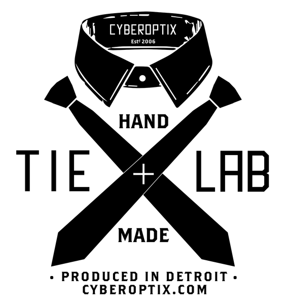 Cyberoptix logo, collar and bones. black and white