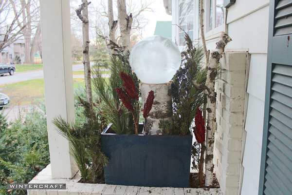 Add other hardwood decorations to the Wintercraft Globe Ice Lantern Perch Front Entrance Planter
