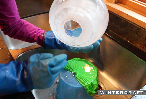 The Wintercraft Globe Ice Lantern has a hole in the bottom because of the Insulation Disk and Freezing Base 