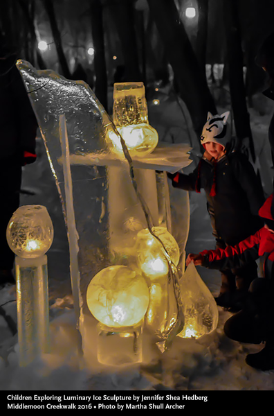 Children Exploring Luminary Ice Sculptures Middlemoon Creekwalk 2016 photo by Martha Shull Archer