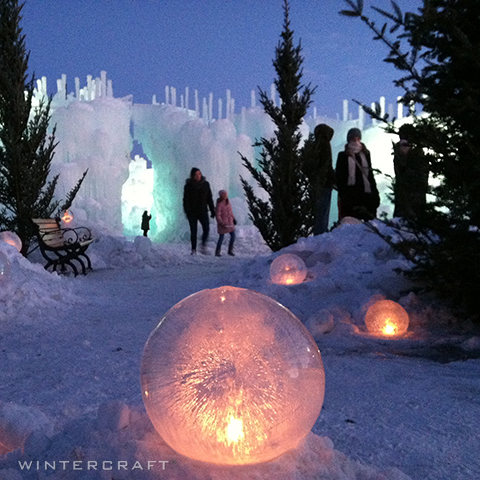 Wintercraft Globe Ice Lanterns on display at Ice Castle entrance 