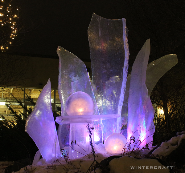 Ice Glass and Globe Ice Lanterns lit with Projecting LED Lights outside REI store Wintercraft