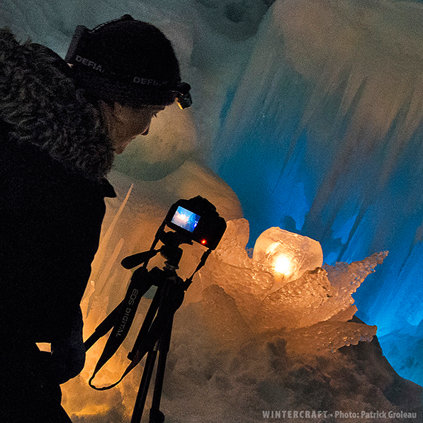 Jen taking picture of ice rose at New Hampshire Ice Castle