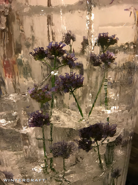 Close up of Floral Bucket Ice Lantern