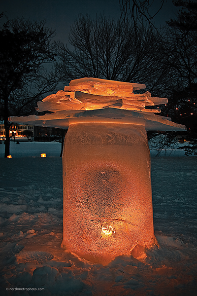 An ice mushroom at the 2010 Luminary Loppet in Minneapolis, MN. To establish scale, the lower area of the sculpture was created using a garbage can!