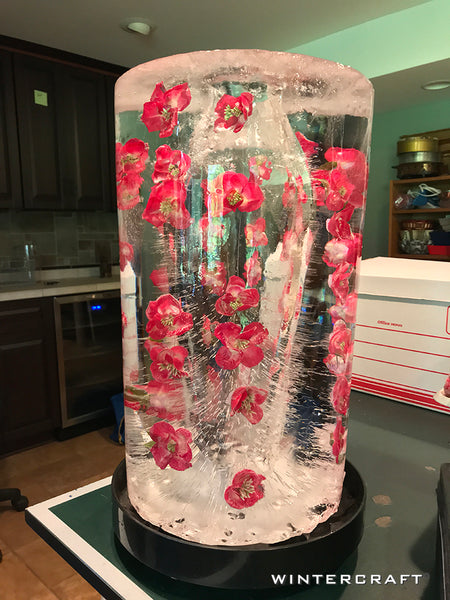 Rose Bucket Ice Lantern in Ice Wrangler's cluttered studio