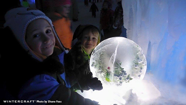 Anna frozen into a globe ice lantern delighted children at the Eden Prairie Ice Castles