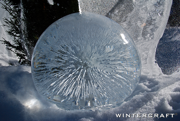 Wintercraft Globe Ice Lantern lit by sun