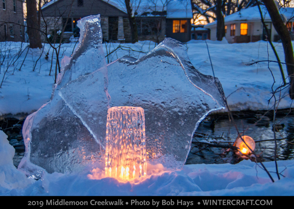 An old Finnish Glass Ice Tower still was pulled out of a snow bank and placed with some ice glass. Photo by Bob Hays 2019 Middlemoon Creekwalk Ice Wrangler