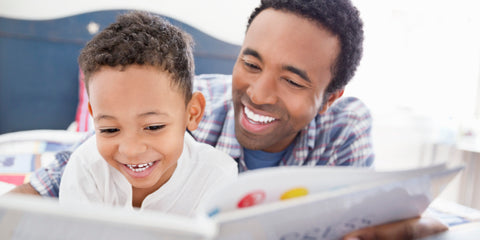 African American Father Reading to Son