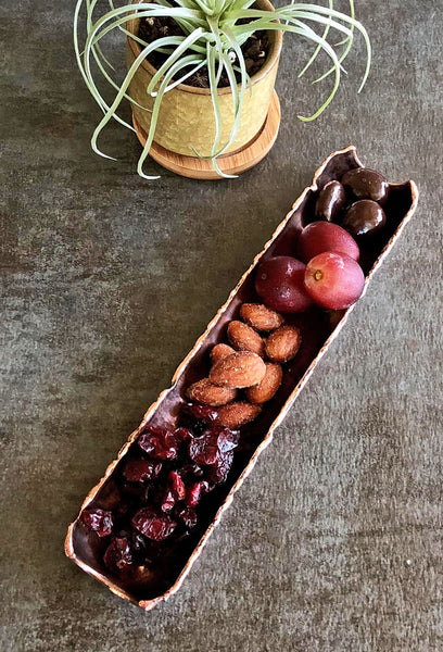 copper tidbit tray with sweets