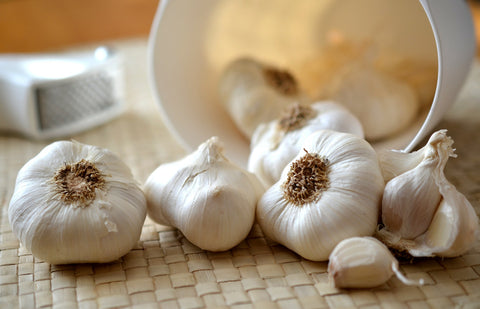 garlic cloves on table