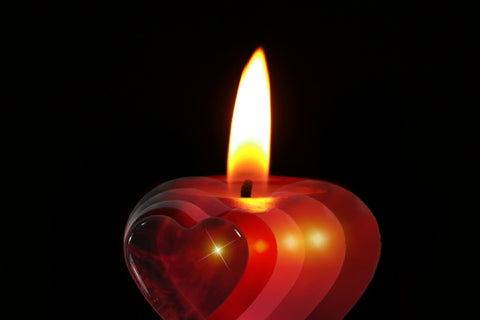 Lit coloured candle