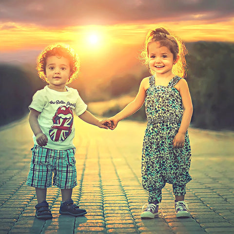 Boy and girl holding hands