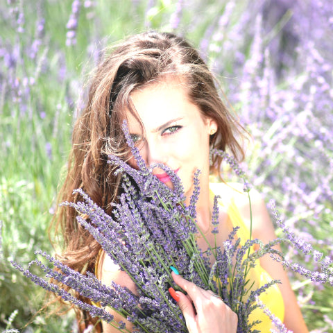 Girl in lavender field with the best solid hair conditioner bar uk