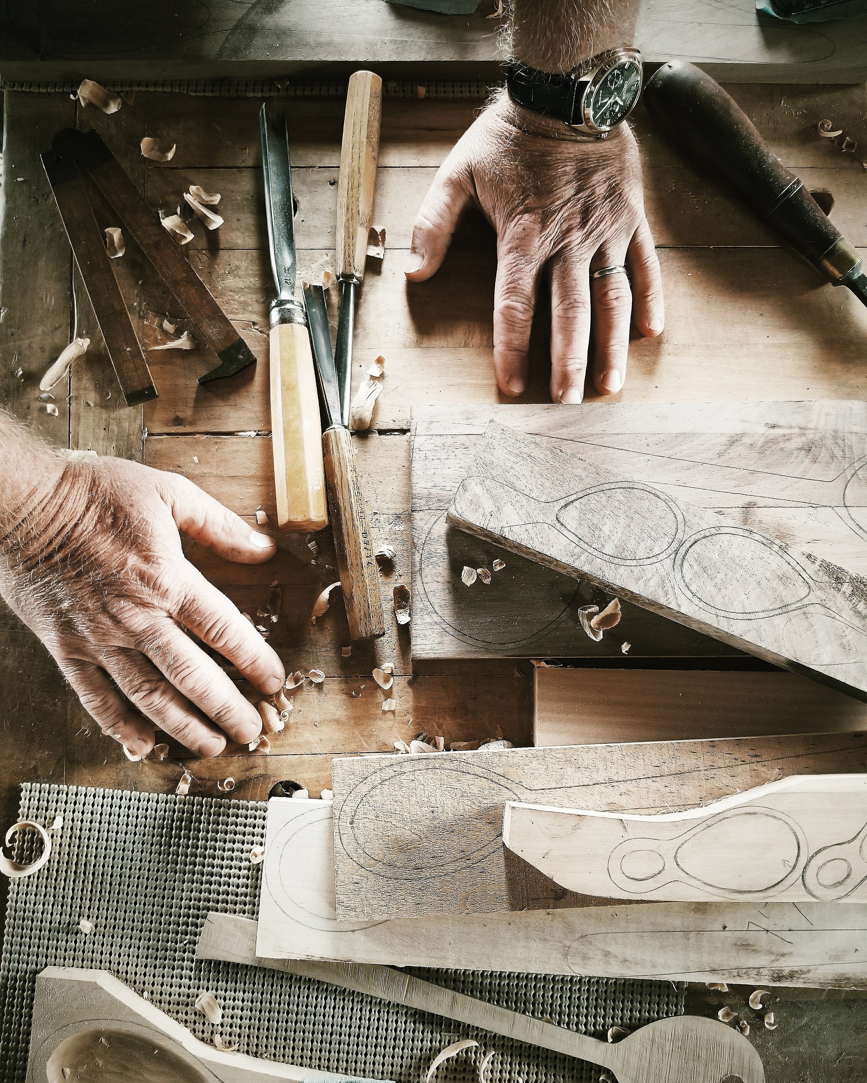 Dad's workbench, hands, tools and dreamware.