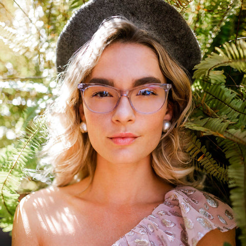 Jade eyeglasses with ultra violet frames and blue light technology lens on a female model