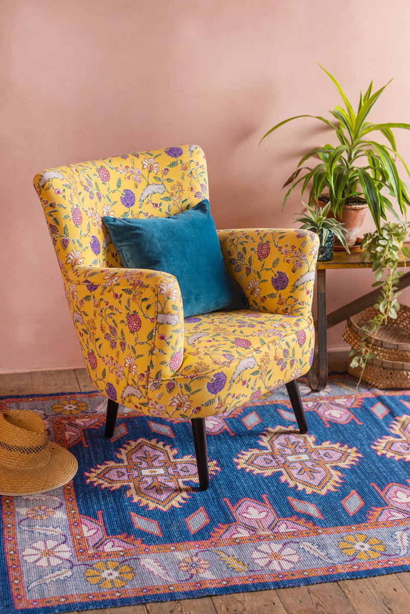 yellow floral armchair