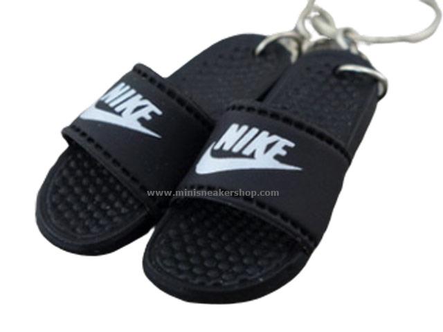 gray nike flip flops