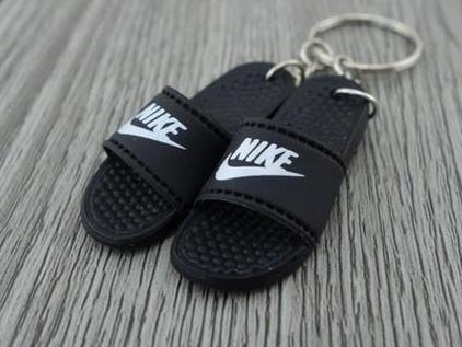 gray nike flip flops