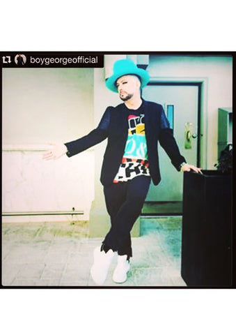 Boy George Wearing Dana Levy Neon Evil Eye Maxi Pompom Friendship Bracelet