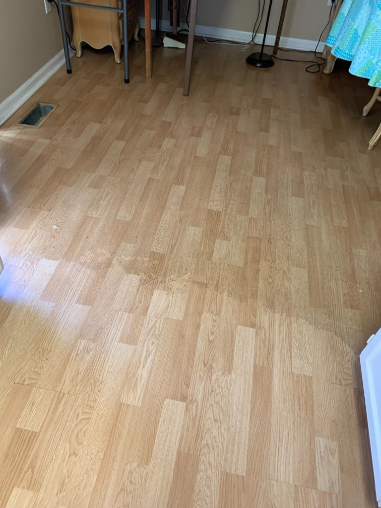 laminate floor half cleaned