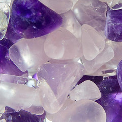 rose quartz and amethyst crystals in water