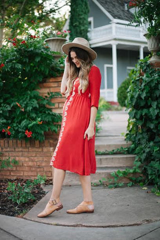 The red Cocinera Dress, a maternity friendly dress by Piper & Scoot