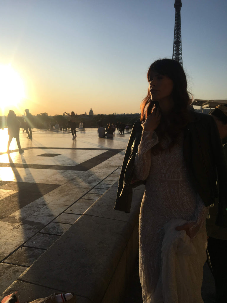 Our model wearing a wedding dress and leather jacket at the eiffel tower.