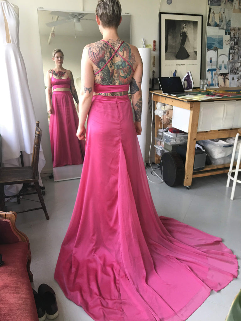 Fitting of Vancouver bride for her custom crop top wedding dress in pink chiffon.