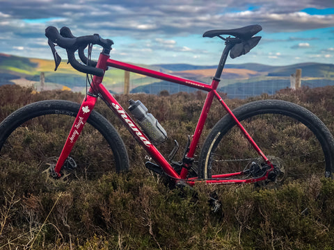 Jennys' Shand Steel Bike in red with Hunt 30 Carbon Dynamo Disc Wheels
