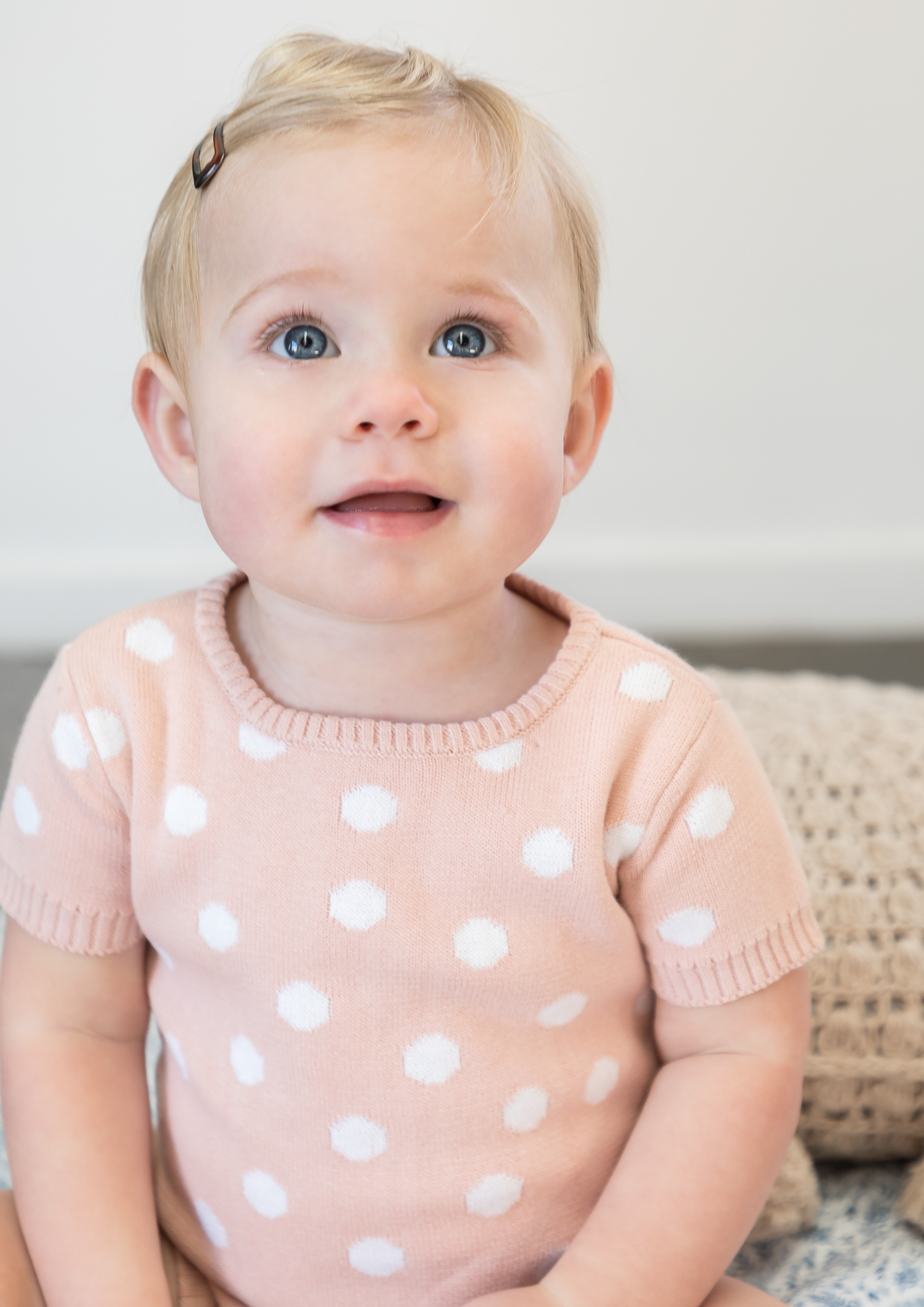 pink and white spot body suit