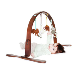 Dark birch wood scooter play gym – wonderful quality and made from sustainable, natural materials.