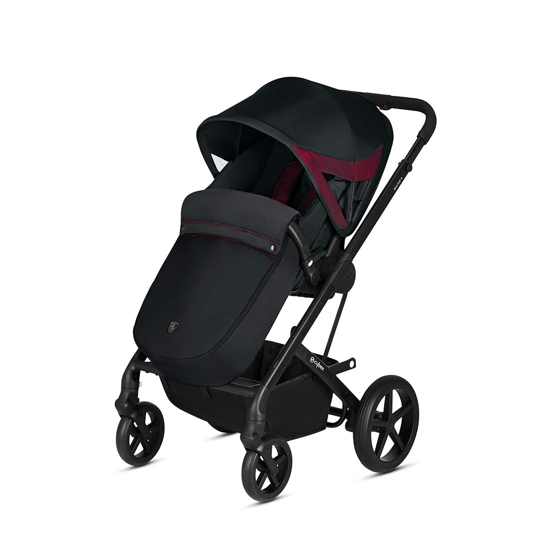 black stroller with footmuff