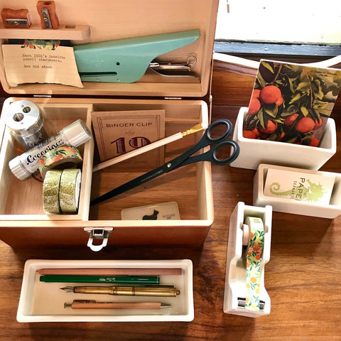 Classiky wood box with washi tape, coccoina glue, pens, pencils, and orange blossom goodness