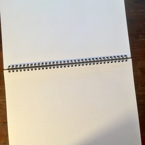 mnemosyne large grid notebook laying open flat