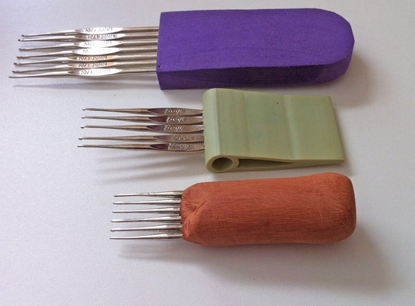 The first three prototypes of the CoatHook Undercoat Pet Comb