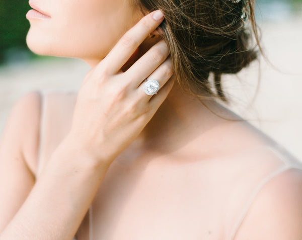 woman wearing diamond engagement ring