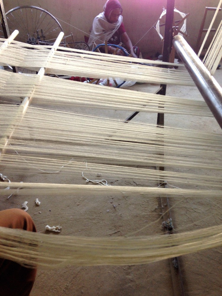 warping yarn to prepare for handloom weaving in india