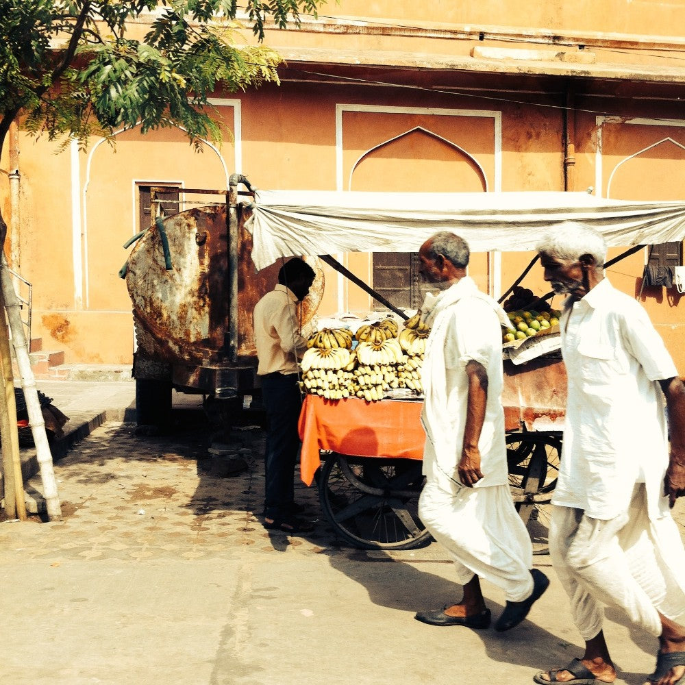 men in jaipur india walking in the market with hand loom traditional dhoti and lungi