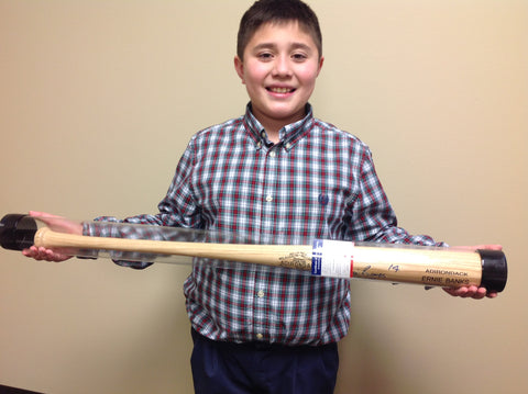 Felix holding Banks Signed Bat