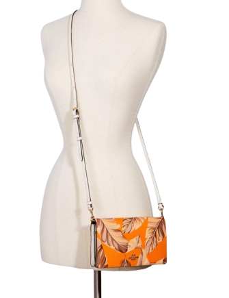 anna foldover crossbody clutch with banana leaves print