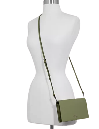 foldover crossbody clutch in polished pebble leather