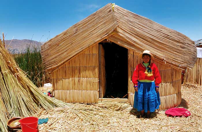 Peruvian Pom Poms: A Native Girl Wearing Traditional Costume on the Islands of Uros