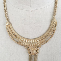 Fringe me down Aztec bib stud necklace with pyramid shapes and fringe with charms