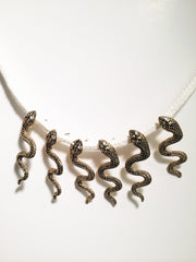 Gold plate snake post earrings