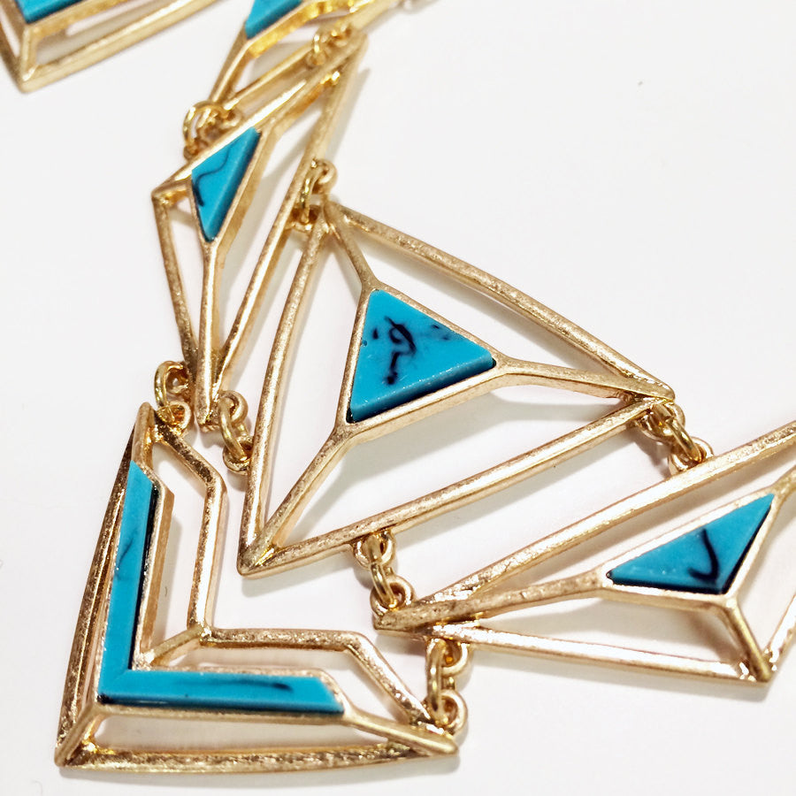 howlite bib necklace Only 2 left in turquoise . Geometric turquoise bib necklace with gold chains