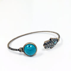 howlite braceletOpen c shape bangle with hand charm with rhinestones and turquoise stone