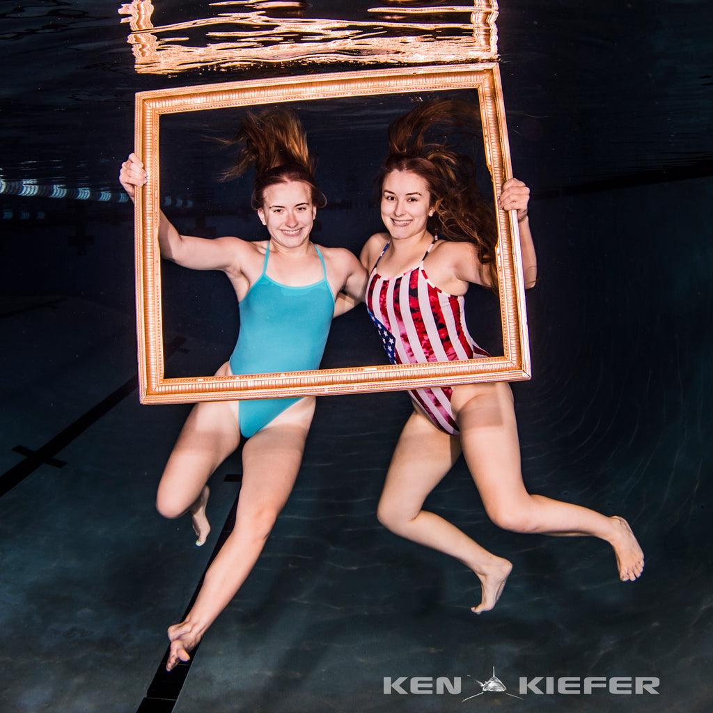 underwater photo of a women swimmer in a JOLYN swimsuit